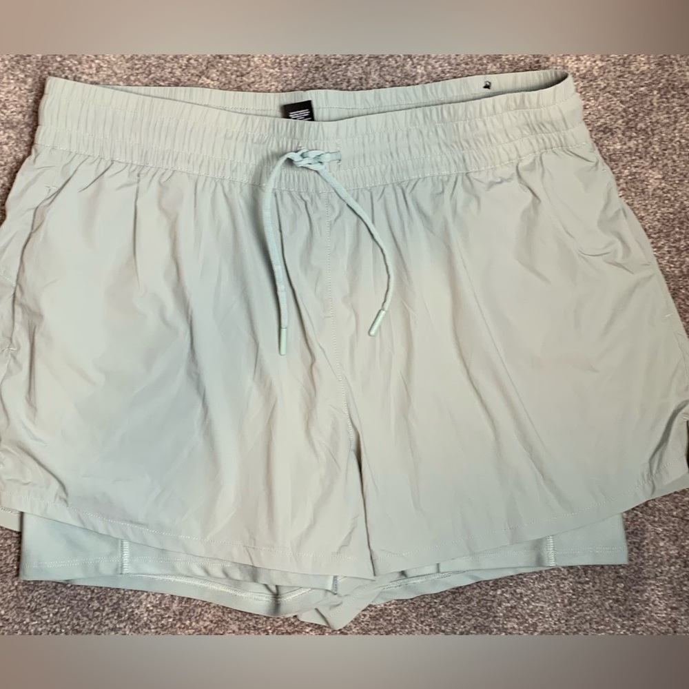 Spyder Women’s running shorts. XL True Sage green